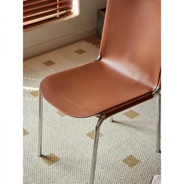 Koko Chair: A trendy, luxurious, comfortable, saddle-leather antique chair for home use.